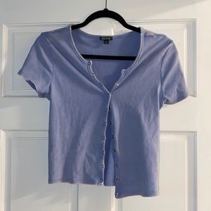 Semi cropped snap button light blue top